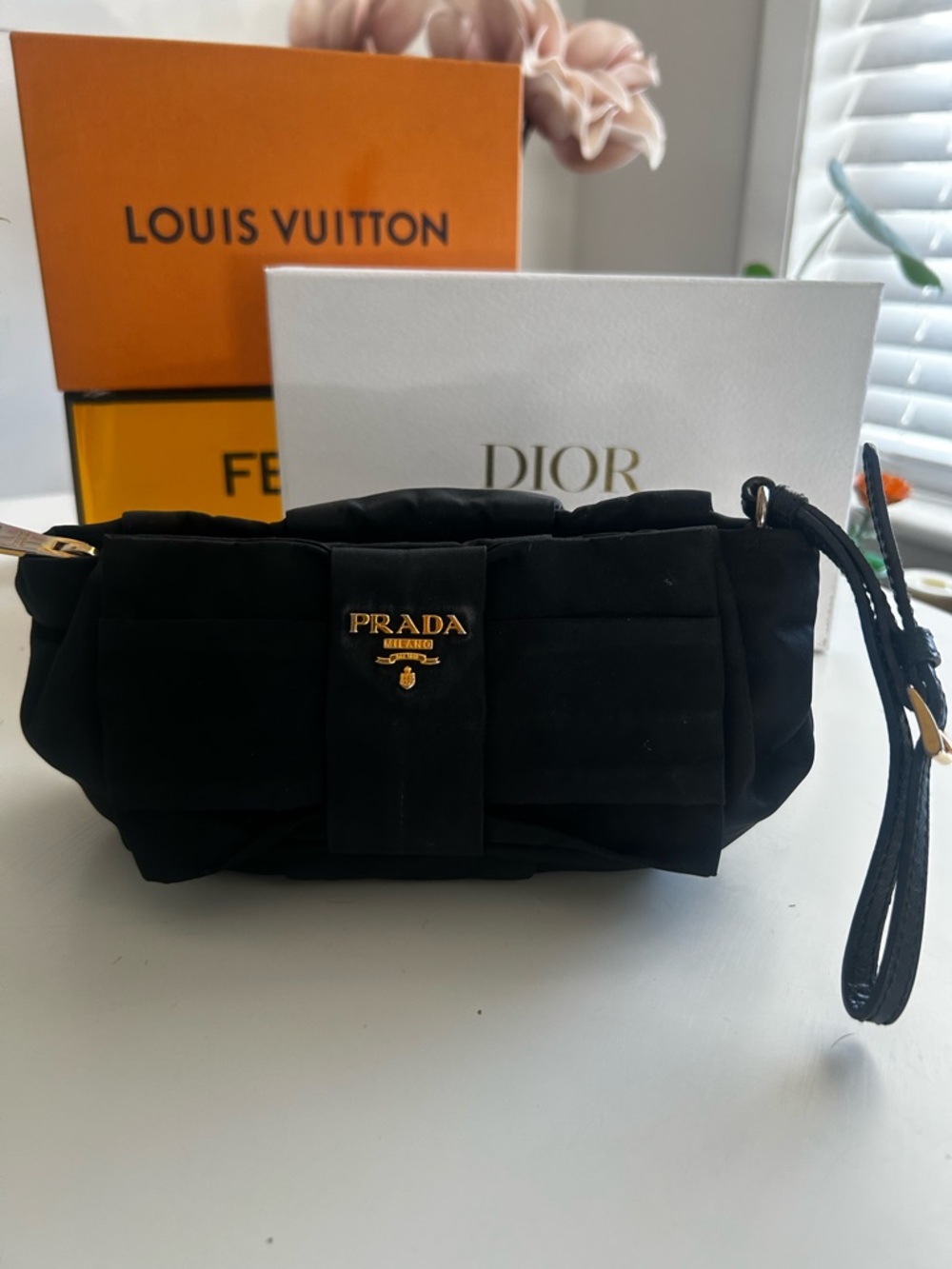 Prada Nylon Logo Ribbon Black Bow Wristlet with Gold Hardware
1N1422 - Picture 6 of 15